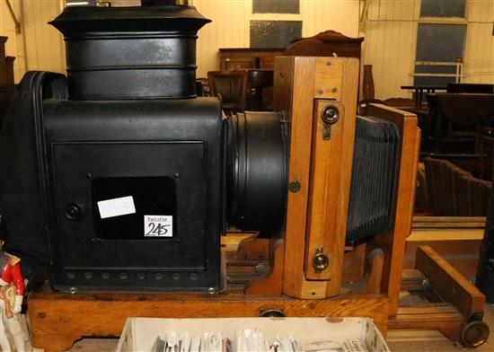 A Victorian oak magic lantern and slides